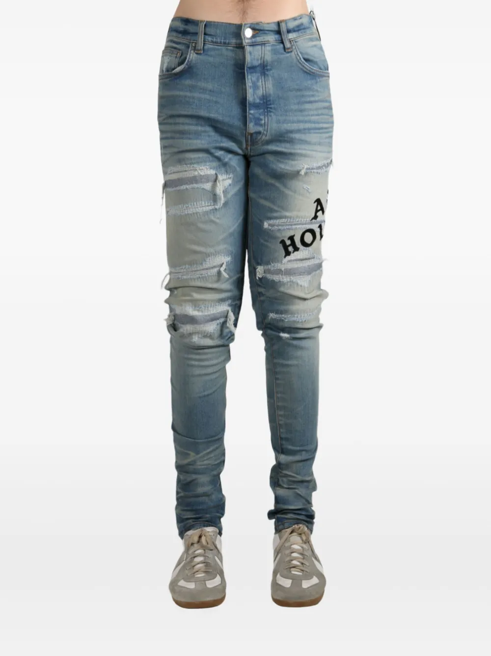 AMIRI distressed embroidered jeans - Bruin